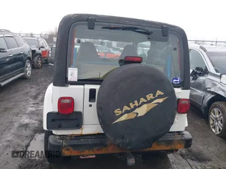 1997 Jeep Wrangler Sahara with VIN 1J4FY49S1VP503639, listed as a IAAI auction lot 41708134 with 102,196 mi miles and . Bid and sale history available at carsss.com. Image 17.