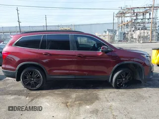 2022 Honda Pilot Special Edition z VIN 5FNYF6H21NB101647, wystawiony jako IAAI lot #42101234 z przebiegiem 32 862 mil mil oraz . Historia ofert i sprzedaży dostępna na DreamBid. Obrazek 13.