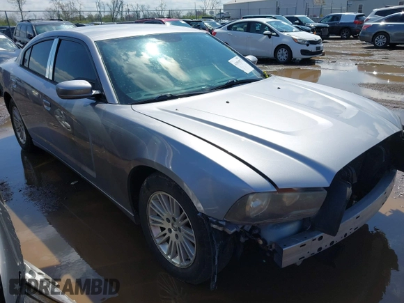 2013 Dodge Charger SE with VIN 2C3CDXBG7DH742812, listed as a IAAI auction lot 41991577 with 124,057 mi miles and . Bid and sale history available at DreamBid. Image 1.