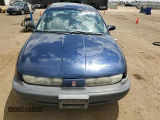 1999 Saturn SL with VIN 1G8ZF5287XZ265634, listed as a Copart auction lot 55973834 with Not Provided miles and Clean Title. Bid and sale history available at carsss.com. Image 5.