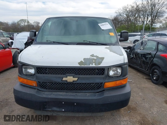 2014 Chevrolet Express Cargo Van with VIN 1GCWGGCA4E1209164, listed as a IAAI auction lot 41838141 with 174,770 mi miles. Bid and sale history available at carsss.com. Image 12.