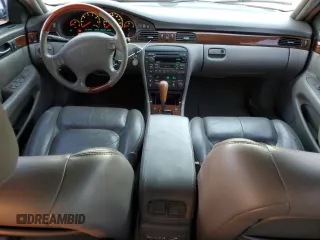 2000 Cadillac Seville Touring STS z VIN 1G6KY5494YU201138, wystawiony jako Copart lot #73485584 z przebiegiem 137 913 mil mil oraz Szkoda całkowita • Salvage title. Historia ofert i sprzedaży dostępna na DreamBid. Obrazek 8.