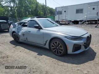 2023 BMW 4 Series 430i xDrive with VIN WBA73AV06PFP29080, listed as a Copart auction lot 60283705 with 47,104 mi miles and Salvage title. Bid and sale history available at DreamBid. Image 4.