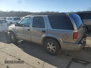 2000 Oldsmobile Bravada z VIN 1GHDT13WXY2255649, wystawiony jako Copart lot #80021214 z przebiegiem Nie podano mil oraz Szkody całkowita. Historia ofert i sprzedaży dostępna na DreamBid. Obrazek 2.