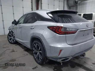 2017 Lexus RX with VIN 2T2BZMCAXHC067275, listed as a IAAI auction lot 41386504 with 100,477 mi miles. Bid and sale history available at carsss.com. Image 3.