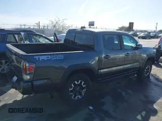 2020 Toyota Tacoma SR5 with VIN 3TMCZ5AN2LM351472, listed as a IAAI auction lot 41621286 with 48,402 mi miles and . Bid and sale history available at DreamBid. Image 4.