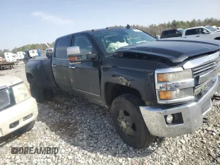 2015 Chevrolet Silverado 3500HD LTZ with VIN 1GC4K0E83FF557114, listed as a Copart auction lot 42821905 with 228,392 mi miles and Salvage Title. Bid and sale history available at DreamBid. Image 4.