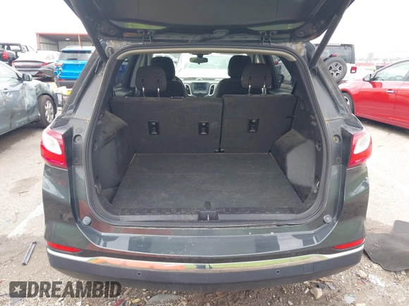 2019 Chevrolet Equinox LT z VIN 2GNAXKEV3K6125060, wystawiony jako IAAI lot #42162180 z przebiegiem 83 100 mil mil oraz . Historia ofert i sprzedaży dostępna na DreamBid. Obrazek 17.