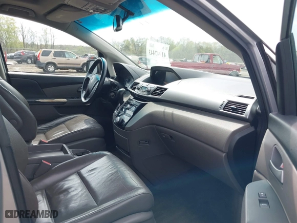 2011 Honda Odyssey EX-L with VIN 5FNRL5H69BB031983, listed as a IAAI auction lot 41947443 with 148,111 mi miles. Bid and sale history available at carsss.com. Image 5.