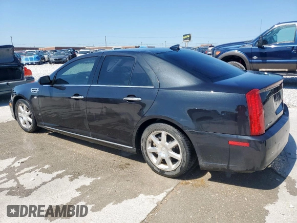 2009 Cadillac STS RWD z VIN 1G6DW67V390103790, wystawiony jako Copart lot #56596915 z przebiegiem 57 537 mil mil oraz Czysty tytuł • Clean title. Historia ofert i sprzedaży dostępna na DreamBid. Obrazek 2.