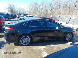 2013 Ford Fusion Titanium Hybrid with VIN 3FA6P0RU5DR339716, listed as a IAAI auction lot 41405835 with 197,840 mi miles. Bid and sale history available at carsss.com. Image 13.