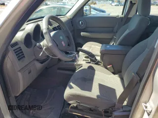 2009 Dodge Nitro SE z VIN 1D8GT28K19W541402, wystawiony jako Copart lot #57487874 z przebiegiem 189 653 mil mil oraz Szkoda całkowita • Salvage title. Historia ofert i sprzedaży dostępna na DreamBid. Obrazek 7.
