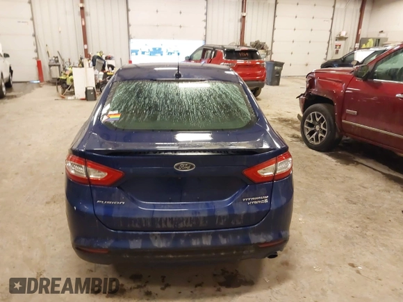 2013 Ford Fusion Titanium Hybrid with VIN 3FA6P0RU9DR320909, listed as a IAAI auction lot 41477530 with 108,153 mi miles. Bid and sale history available at carsss.com. Image 16.