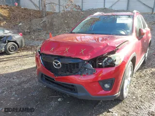 2014 Mazda CX-5 Grand Touring with VIN JM3KE2DY1E0380423, listed as a IAAI auction lot 41854206 with 129,763 mi miles. Bid and sale history available at carsss.com. Image 6.