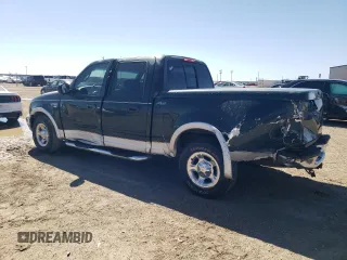 2001 Ford F-150 XLT with VIN 1FTRW07L21KF52515, listed as a Copart auction lot 48303905 with 236,567 mi miles and Salvage title. Bid and sale history available at DreamBid. Image 2.