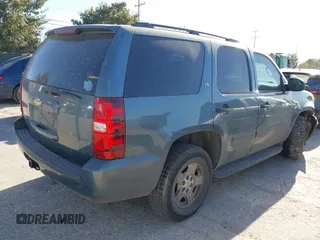 2008 Chevrolet Tahoe LS with VIN 1GNFC13C08R117881, listed as a IAAI auction lot 41216586 with 285,270 mi miles and . Bid and sale history available at DreamBid. Image 4.