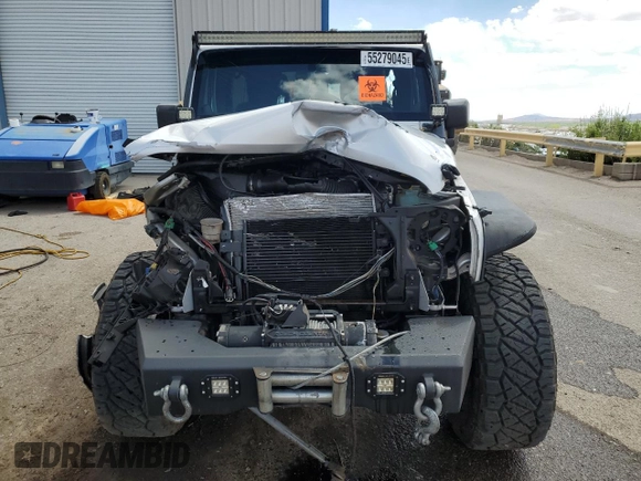2012 Jeep Wrangler Unlimited Altitude with VIN 1C4HJWEG8CL163653, listed as a Copart auction lot 55279045 with 107,076 mi miles and Salvage title. Bid and sale history available at DreamBid. Image 5.