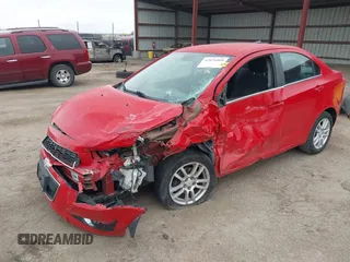 2012 Chevrolet Sonic LT with VIN 1G1JC5SH7C4133484, listed as a IAAI auction lot 42076809 with 100,506 mi miles and . Bid and sale history available at DreamBid. Image 17.