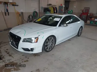 2013 Audi S8 z VIN WAUD2AFD7DN008887, wystawiony jako IAAI lot #42314337 z przebiegiem 155 978 mil mil oraz . Historia ofert i sprzedaży dostępna na DreamBid. Obrazek 2.