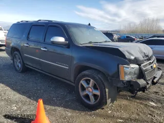 2014 Chevrolet Suburban LTZ with VIN 1GNSCKE08ER230741, listed as a Copart auction lot 47234095 with 184,263 mi miles and Salvage Title. Bid and sale history available at carsss.com. Image 4.