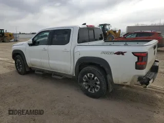 2022 Nissan Frontier Pro-4X z VIN 1N6ED1EK0NN668348, wystawiony jako Copart lot #52364335 z przebiegiem 50 861 mil mil oraz Szkoda całkowita • Salvage title. Historia ofert i sprzedaży dostępna na DreamBid. Obrazek 2.