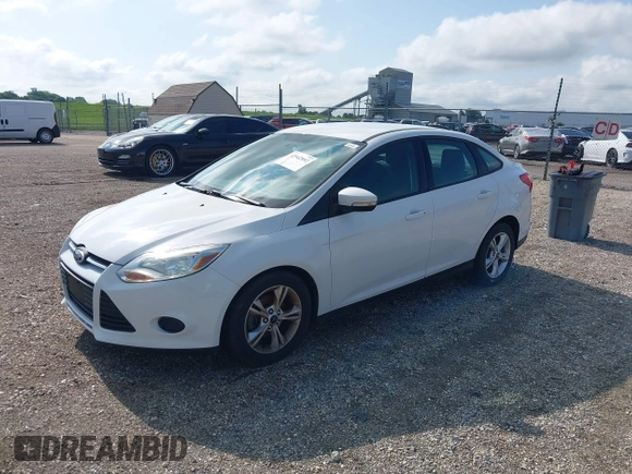 2013 Ford Focus SE with VIN 1FADP3F23DL208410, listed as a IAAI auction lot 42542892 with 111,392 mi miles and . Bid and sale history available at DreamBid. Image 2.