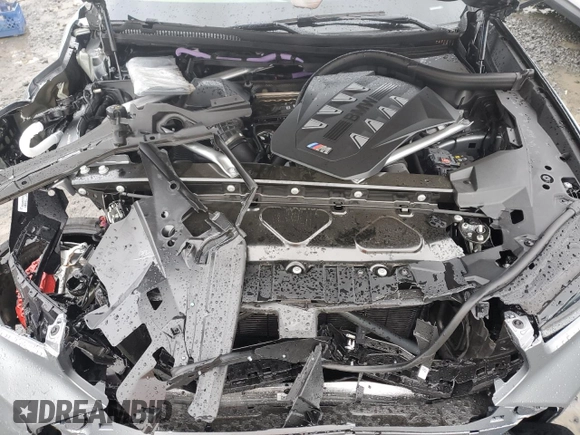 2025 BMW X6 M60i with VIN 5UX43EX01S9X34140, listed as a Copart auction lot 82425694 with 6,844 mi miles and Salvage Title. Bid and sale history available at carsss.com. Image 12.