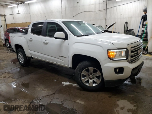 2015 GMC Canyon 4WD SLE with VIN 1GTG6BE32F1261399, listed as a Copart auction lot 43572805 with 145,113 mi miles and Salvage Title. Bid and sale history available at carsss.com. Image 4.
