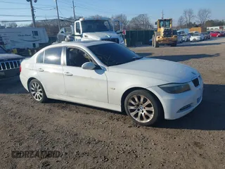 2008 BMW 3 Series 335xi with VIN WBAVD53598A285654, listed as a IAAI auction lot 41366017 with 999,999 mi miles. Bid and sale history available at carsss.com. Image 1.