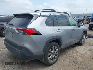 2024 Toyota RAV4 XLE Premium with VIN 2T3C1RFV2RC263246, listed as a IAAI auction lot 42156347 with 23,456 mi miles and . Bid and sale history available at DreamBid. Image 4.