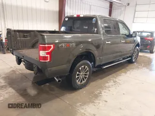 2018 Ford F-150 XL with VIN 1FTEW1EG3JKE52823, listed as a IAAI auction lot 41413009 with 142,057 mi miles. Bid and sale history available at carsss.com. Image 4.