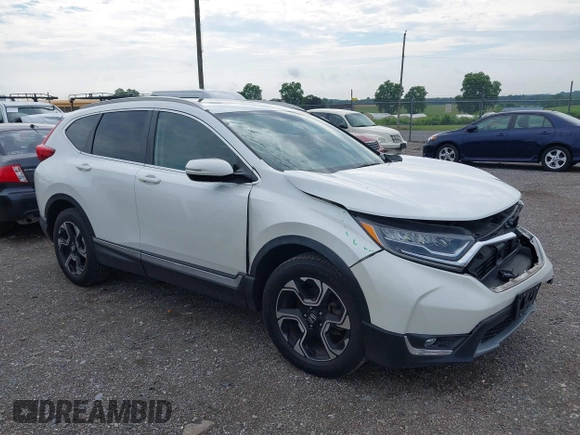 2018 Honda CR-V Touring with VIN 2HKRW2H91JH665241, listed as a IAAI auction lot 42638694 with 62,066 mi miles and . Bid and sale history available at DreamBid. Image 1.