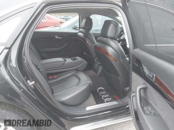 2011 Audi A8 z VIN WAURVAFDXBN026102, wystawiony jako IAAI lot #39096660 z przebiegiem 151 060 mil mil oraz . Historia ofert i sprzedaży dostępna na DreamBid. Obrazek 8.