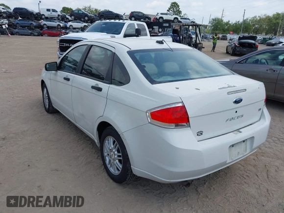 2009 Ford Focus SE with VIN 1FAHP35NX9W203482, listed as a IAAI auction lot 41870714 with 184,823 mi miles. Bid and sale history available at carsss.com. Image 3.