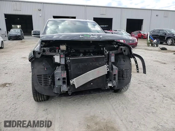 2021 Jeep Grand Cherokee Overland with VIN 1C4RJJDG4M8175523, listed as a Copart auction lot 87929345 with 53,380 mi miles and Salvage title. Bid and sale history available at DreamBid. Image 12.