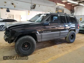 1996 Jeep Grand Cherokee Laredo with VIN 1J4GZ58S9TC370707, listed as a Copart auction lot 89285205 with 278,457 mi miles and Salvage Title. Bid and sale history available at carsss.com. Image 1.