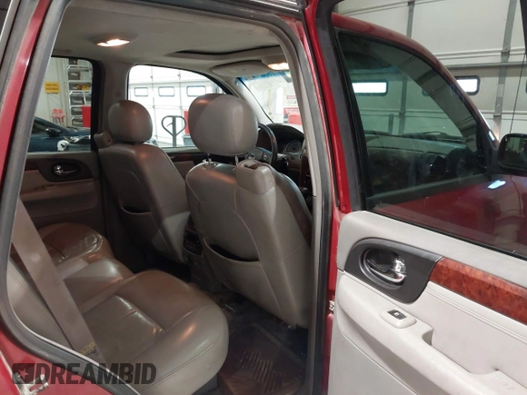 2005 GMC Envoy SLT with VIN 1GKDT13S352324863, listed as a IAAI auction lot 41707649 with 247,326 mi miles. Bid and sale history available at carsss.com. Image 8.