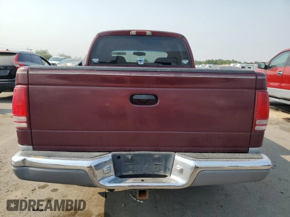 2000 Dodge Dakota Sport with VIN 1B7GG2AN1YS699073, listed as a Copart auction lot 70782284 with 141,876 mi miles and Salvage Title. Bid and sale history available at carsss.com. Image 6.
