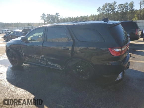2020 Dodge Durango R/T z VIN 1C4SDHCT6LC394401, wystawiony jako Copart lot #87300014 z przebiegiem 64 519 mil mil oraz Szkoda całkowita • Salvage title. Historia ofert i sprzedaży dostępna na DreamBid. Obrazek 2.