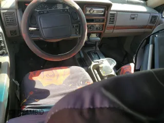1995 Jeep Grand Cherokee Limited с VIN 1J4GZ78SXSC579786, выставлен на аукционе Copart как лот 72280424 с пробегом Не указан миль и На запчасти • Non repairable. История ставок и продаж доступна на DreamBid. Изображение 8.