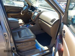 2003 Acura MDX Touring Pkg with VIN 2HNYD18623H549599, listed as a IAAI auction lot 41879934 with 242,896 mi miles. Bid and sale history available at carsss.com. Image 5.
