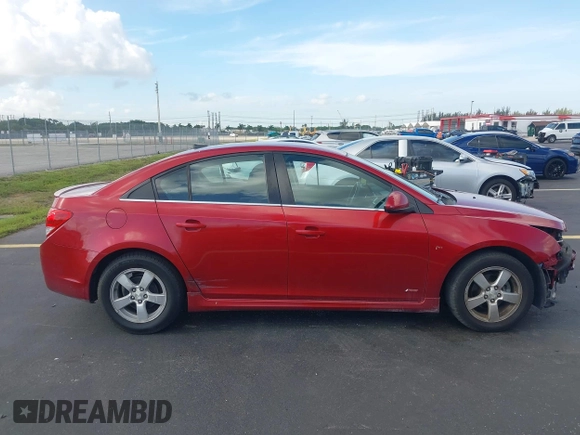 2014 Chevrolet Cruze 1LT z VIN 1G1PC5SB6E7246477, wystawiony jako IAAI lot #42550598 z przebiegiem 98 813 mil mil oraz . Historia ofert i sprzedaży dostępna na DreamBid. Obrazek 14.