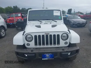 2017 Jeep Wrangler Unlimited 75th Anniversary z VIN 1C4HJWEG8HL502984, wystawiony jako IAAI lot #42354671 z przebiegiem 108 900 mil mil oraz . Historia ofert i sprzedaży dostępna na DreamBid. Obrazek 12.