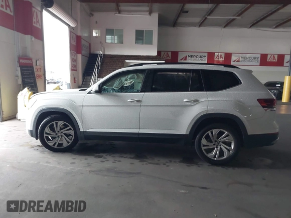 2021 Volkswagen Atlas 3.6L V6 SE w/Technology with VIN 1V2KR2CA8MC501445, listed as a IAAI auction lot 41798934 with 74,764 mi miles. Bid and sale history available at carsss.com. Image 13.