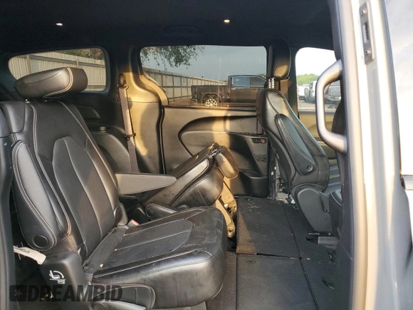 2023 Chrysler Pacifica Touring L with VIN 2C4RC1BG4PR505313, listed as a Copart auction lot 54069305 with 24,687 mi miles and Salvage title. Bid and sale history available at DreamBid. Image 11.