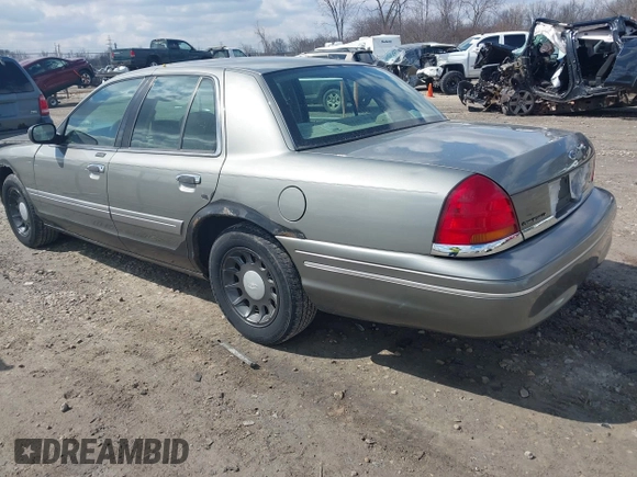 2001 Ford Crown Victoria LX z VIN 2FAFP74W01X102534, wystawiony jako IAAI lot #42017605 z przebiegiem 160 063 mil mil oraz . Historia ofert i sprzedaży dostępna na DreamBid. Obrazek 3.