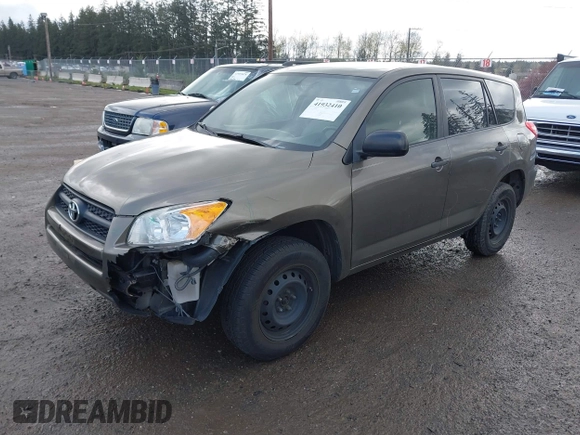 2009 Toyota RAV4 with VIN JTMZF33V995001985, listed as a IAAI auction lot 41932410 with 113,713 mi miles. Bid and sale history available at carsss.com. Image 2.