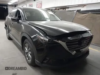 2018 Mazda CX-9 Touring with VIN JM3TCACY9J0213310, listed as a IAAI auction lot 42047663 with 78,409 mi miles and . Bid and sale history available at carsss.com. Image 1.