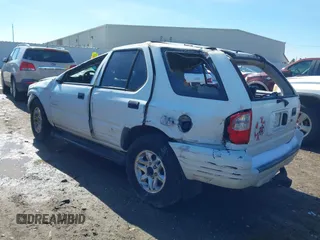 2004 Isuzu Rodeo S with VIN 4S2CK58W944315203, listed as a IAAI auction lot 41355461 with Not provided miles and . Bid and sale history available at DreamBid. Image 3.