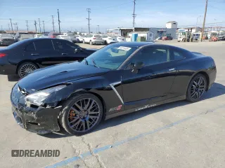 2016 Nissan GT-R Premium z VIN JN1AR5EF8GM290918, wystawiony jako Copart lot #58314455 z przebiegiem 23 667 mil mil oraz Szkody całkowita. Historia ofert i sprzedaży dostępna na DreamBid. Obrazek 1.